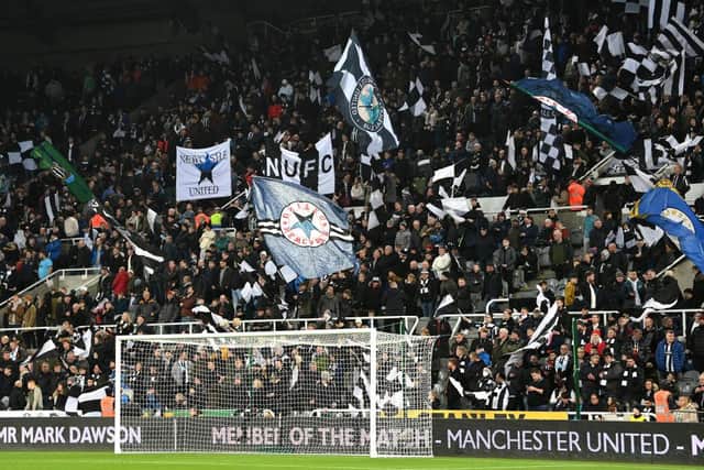 NEWCASTLE UPON TYNE, ENGLAND - DECEMBER 27: General view inside the stadium as fans show support prior to the Premier League match between Newcastle United  and  Manchester United at St James' Park on December 27, 2021 in Newcastle upon Tyne, England. (Photo by Stu Forster/Getty Images)