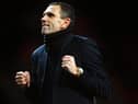 MANCHESTER, ENGLAND - JANUARY 22:  Gus Poyet the Sunderland manager celebrates after his team won 2-1 in the penalty shootout during the Capital One Cup semi final, second leg match between Manchester United and Sunderland at Old Trafford on January 22, 2014 in Manchester, England.  (Photo by Laurence Griffiths/Getty Images)