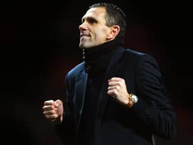 MANCHESTER, ENGLAND - JANUARY 22:  Gus Poyet the Sunderland manager celebrates after his team won 2-1 in the penalty shootout during the Capital One Cup semi final, second leg match between Manchester United and Sunderland at Old Trafford on January 22, 2014 in Manchester, England.  (Photo by Laurence Griffiths/Getty Images)