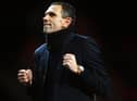 MANCHESTER, ENGLAND - JANUARY 22:  Gus Poyet the Sunderland manager celebrates after his team won 2-1 in the penalty shootout during the Capital One Cup semi final, second leg match between Manchester United and Sunderland at Old Trafford on January 22, 2014 in Manchester, England.  (Photo by Laurence Griffiths/Getty Images)