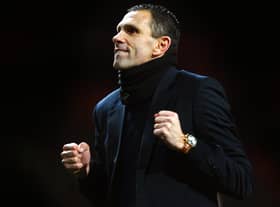 MANCHESTER, ENGLAND - JANUARY 22:  Gus Poyet the Sunderland manager celebrates after his team won 2-1 in the penalty shootout during the Capital One Cup semi final, second leg match between Manchester United and Sunderland at Old Trafford on January 22, 2014 in Manchester, England.  (Photo by Laurence Griffiths/Getty Images)