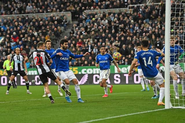 Ryan Fraser scores the second Newcastle goal during the Premier League match between Newcastle United and Everton (Photo by Stu Forster/Getty Images)