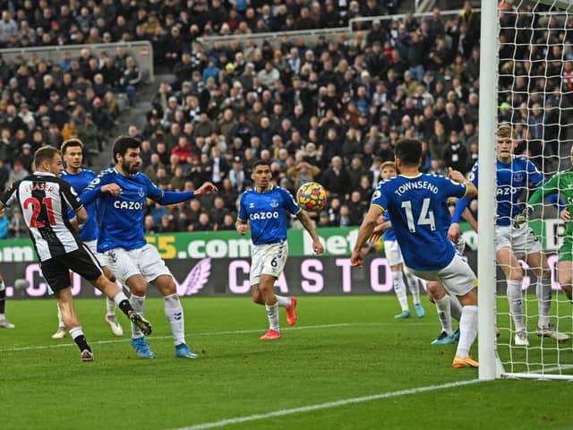 Ryan Fraser scores the second Newcastle goal during the Premier League match between Newcastle United and Everton (Photo by Stu Forster/Getty Images)
