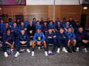 The Prince of Wales posing with the England squad yesterday ahead of the World Cup in Qatar.