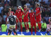 Scotland's Leigh Griffiths scores a free kick during their last game against England; a 2-2 draw at Hampden Park in 2017. PA image.