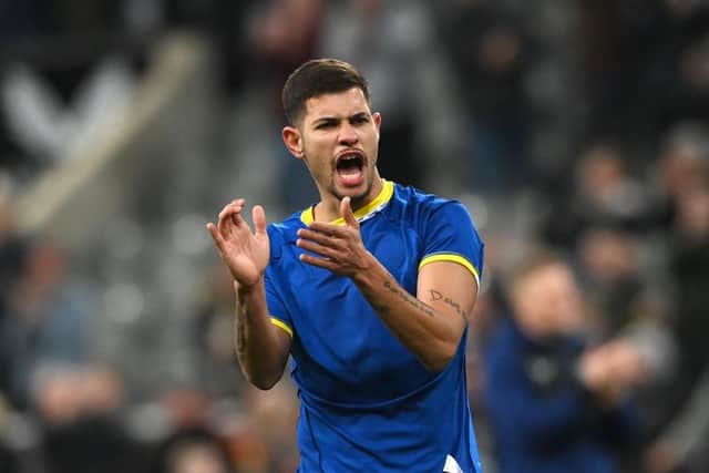 Newcastle Bruno Guimaraes applauds the fans after his league debut after the Premier League match between Newcastle United  and  Everton at St. James Park on February 08, 2022 in Newcastle upon Tyne, England. (Photo by Stu Forster/Getty Images)