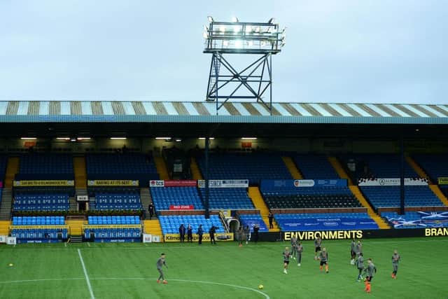 KILMARNOCK, SCOTLAND - NOVEMBER 01: General view inside the stadium as Rangers players warm up prior to the Ladbrokes Scottish Premiership match between Kilmarnock and Rangers at Rugby Park on November 01, 2020 in Kilmarnock, Scotland. Sporting stadiums around the UK remain under strict restrictions due to the Coronavirus Pandemic as Government social distancing laws prohibit fans inside venues resulting in games being played behind closed doors. (Photo by Mark Runnacles/Getty Images)