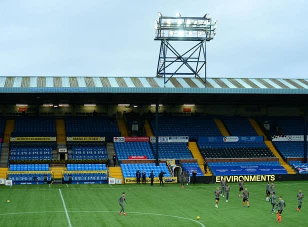 KILMARNOCK, SCOTLAND - NOVEMBER 01: General view inside the stadium as Rangers players warm up prior to the Ladbrokes Scottish Premiership match between Kilmarnock and Rangers at Rugby Park on November 01, 2020 in Kilmarnock, Scotland. Sporting stadiums around the UK remain under strict restrictions due to the Coronavirus Pandemic as Government social distancing laws prohibit fans inside venues resulting in games being played behind closed doors. (Photo by Mark Runnacles/Getty Images)