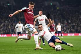 Harrison Ashby of West Ham United is challenged by Sergio Reguilon of Tottenham Hotspur during the Carabao Cup Quarter Final match between Tottenham Hotspur and West Ham United at Tottenham Hotspur Stadium on December 22, 2021 in London, England. (Photo by Shaun Botterill/Getty Images)
