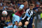 Newcastle United's English defender Kieran Trippier (R) vies with Burnley's English midfielder Dwight McNeil (L) during the English Premier League football match between Burnley and Newcastle United at Turf Moor in Burnley, north west England on May 22, 2022. (Photo by LINDSEY PARNABY/AFP via Getty Images)