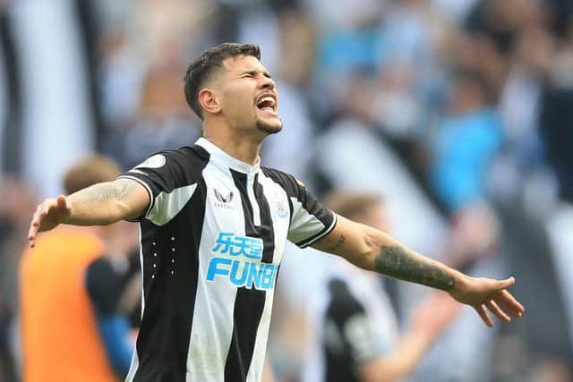 Newcastle United's Brazilian midfielder Bruno Guimaraes celebrates on the pitch after the English Premier League football match between Newcastle United and Leicester City at St James' Park in Newcastle-upon-Tyne, north east England on April 17, 2022.(Photo by LINDSEY PARNABY/AFP via Getty Images)
