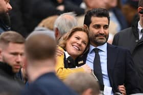 Newcastle United co-owners Amanda Staveley and husband Mehrdad Ghodoussi embrace as their Wedding anniversary is displayed on the big screen during the Premier League match between Newcastle United and Aston Villa at St. James Park on October 29, 2022 in Newcastle upon Tyne, England. (Photo by Stu Forster/Getty Images)