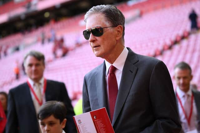 Liverpool's US owner John W. Henry leaves his seat after the English Premier League football match between Liverpool and Bournemouth at Anfield in Liverpool, north west England on August 27, 2022. - Liverpool won the game 9-0. (Photo by OLI SCARFF/AFP via Getty Images)