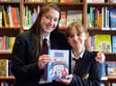 Hebburn Comprehensive School pupils Erin Dunn, 13 and Christina O'Brien, 12, have had their pandemic paintings published in a book to raise money for the NHS.