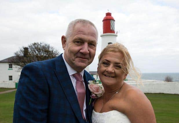 Julie and Gary Docherty at Souter Lighthouse on their wedding day. Photo by Victoria Geldard.