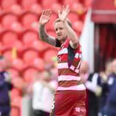James Coppinger leaves the field for the final time.