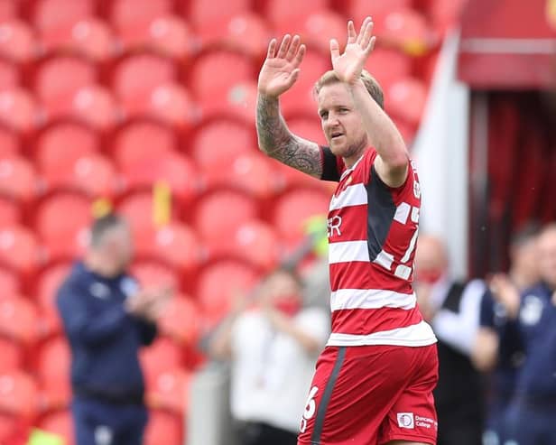 James Coppinger leaves the field for the final time.