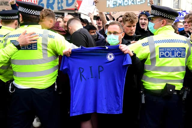 Chelsea fans protest outside Stamford Bridge.