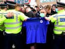 Chelsea fans protest outside Stamford Bridge.