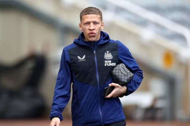 Dwight Gayle of Newcastle United arrives at the stadium prior to the Premier League match between Newcastle United and Brighton & Hove Albion at St. James Park on March 05, 2022 in Newcastle upon Tyne, England. (Photo by Ian MacNicol/Getty Images)