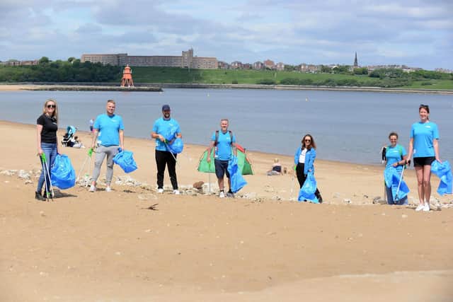 One of the beach clean teams out at Littlehaven on World Oceans Day