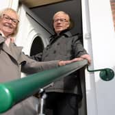 South Tyneside Council Cllr Anne Hetherington with resident Kenneth Stephenson, and the grab rail fitted to the outside of his home.
