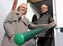 South Tyneside Council Cllr Anne Hetherington with resident Kenneth Stephenson, and the grab rail fitted to the outside of his home.