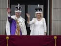 King Charles III and Queen Camilla wave to the crowds from the balcony at Buckingham Palace (Picture: Christopher Furlong/Getty Images)