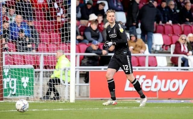 Goalkeeper Alex Bass