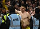 Newcastle United goalkeeper Nick Pope celebrates with fans at the City Ground.