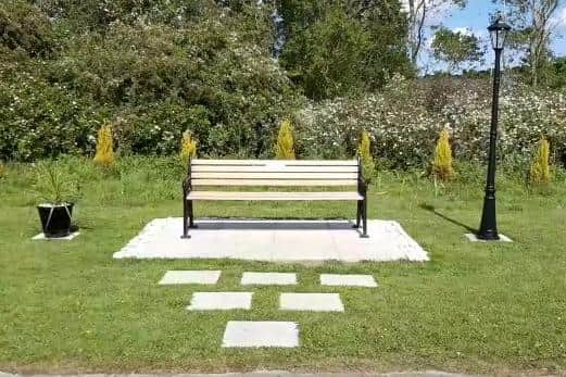 Fencing that goes around the bench has been stolen.