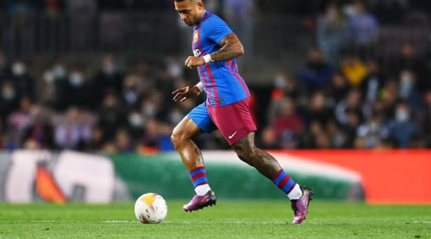 Memphis Depay of Barcelona dribbles with the ball during the LaLiga Santander match between FC Barcelona and Cadiz CF at Camp Nou on April 18, 2022 in Barcelona, Spain. (Photo by David Ramos/Getty Images)