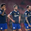 Southampton players show their disappointment during the Premier League match against Manchester United.