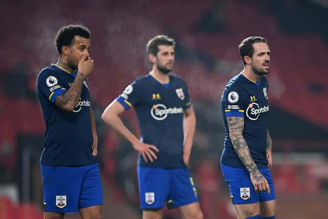 Southampton players show their disappointment during the Premier League match against Manchester United.