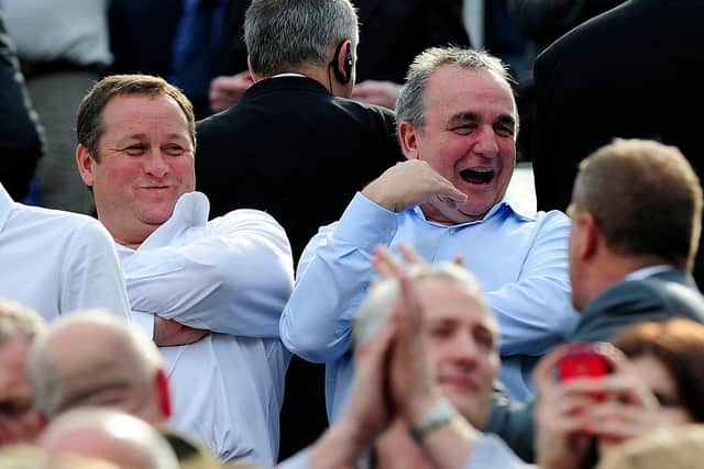 NEWCASTLE UPON TYNE, ENGLAND - MAY 19:  Newcastle owner Mike Ashley and Managing Director Derek Llambias look on during the Barclays Premier League match between Newcastle United and Arsenal at St James' Park on May 19, 2013 in Newcastle upon Tyne, England.