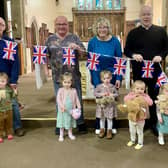 Reverend Paul Barker, Rector of the Boldons, with the Little Angels Toddler Group getting ready for the Royal Teddy Bears Picnic at St Nicholas Church.