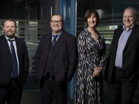 Christine Griffiths with company directors l-r Stephen Green, Neil Mullen and Gary Stoker,