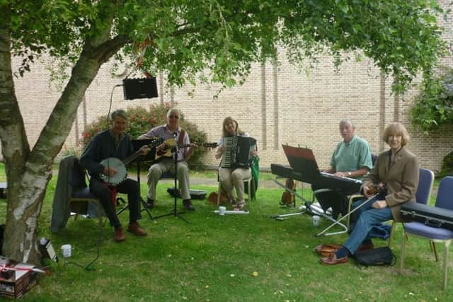 Michael Fitzsimons, second from right, was also a talented keyboard player with folk band Seganainm. His wife Trish is on accordion, centre.