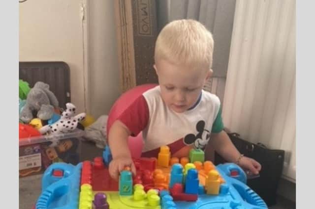 Elijah playing with his building blocks