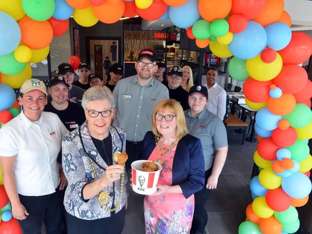 KFC South Shields opens its doors for customers following a refurbishment. Mayor Pat Hay and mayoress Jean Copp with the team.