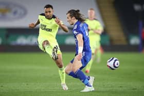 Newcastle United's English striker Callum Wilson (L) vies with Leicester City's Turkish defender Caglar Soyuncu during the English Premier League football match between Leicester City and Newcastle United at King Power Stadium in Leicester, central England on May 7, 2021.