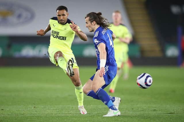 Newcastle United's English striker Callum Wilson (L) vies with Leicester City's Turkish defender Caglar Soyuncu during the English Premier League football match between Leicester City and Newcastle United at King Power Stadium in Leicester, central England on May 7, 2021.