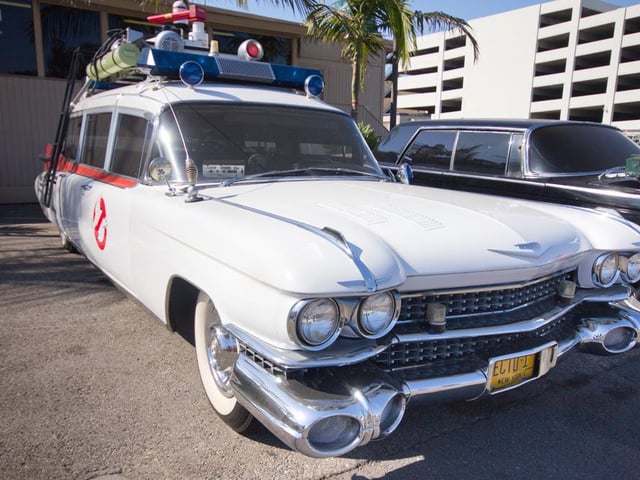 Ecto-1 or the Ectomobile from 1984's Ghostbusters. A 1959 Cadillac ambulance/hearse built by coachworkers Miller-Meteor