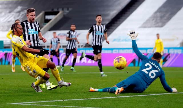Fulham's Jamaican striker Bobby Decordova-Reid shoots but fails to score during the English Premier League football match between Newcastle United and Fulham at St James' Park in Newcastle-upon-Tyne, north east England on December 19, 2020.