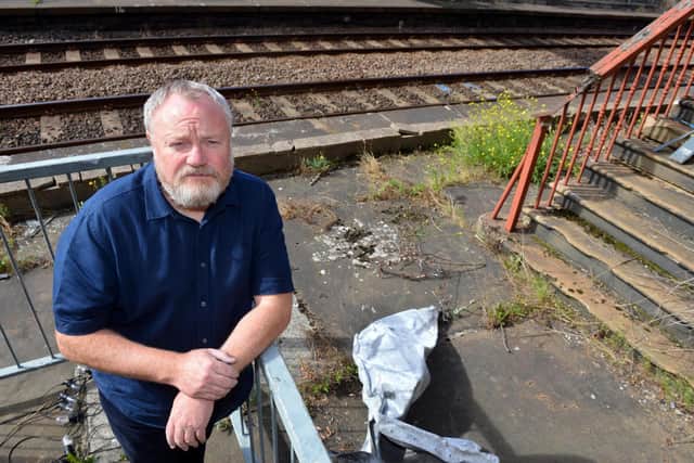 Fans Museum founder Michael Ganley with some of the lead which was pulled from the roof.