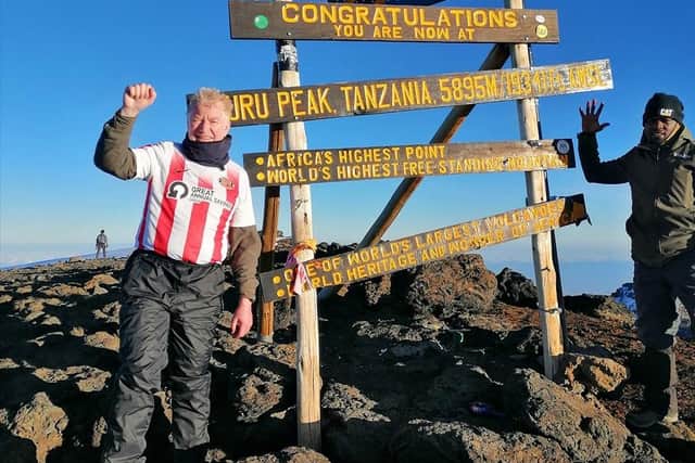 Paul at the top of Mount Kilimanjaro, wearing his Sunderland AFC shirt
