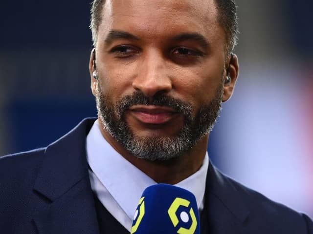 French former football player and Canal Plus TV host Habib Beye speaks prior to the French L1 football match between Paris-Saint Germain (PSG) and AS Monaco FC at The Parc des Princes Stadium in Paris on February 21, 2021. (Photo by FRANCK FIFE / AFP) (Photo by FRANCK FIFE/AFP via Getty Images)