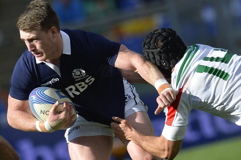 February 22, 2014: Italy 20, Scotland 21, Six Nations
Stuart Hogg being tackled by Italian winger Angelo Esposito at the Stadio Olimpico in Rome (Photo: Andreas Solaro/AFP via Getty Images)