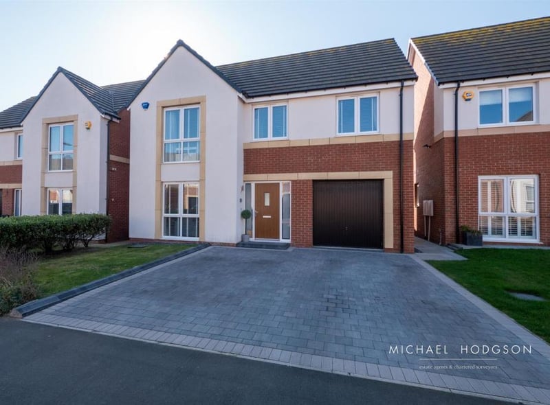 This detached four bed home is located on Range View in Whitburn and is on the market for £495,000 with Michael Hodgson.
