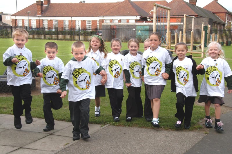 Pupils from Grange Park Primary School walking round their school yard as part of Walk To School Week 12 years ago. Who do you recognise?